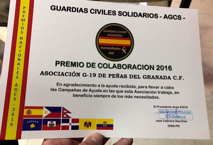 Premio recibido por la Asociación G19 Peñas Granada CF gracias a su solidaridad en la ayuda con los más necesitados. G19